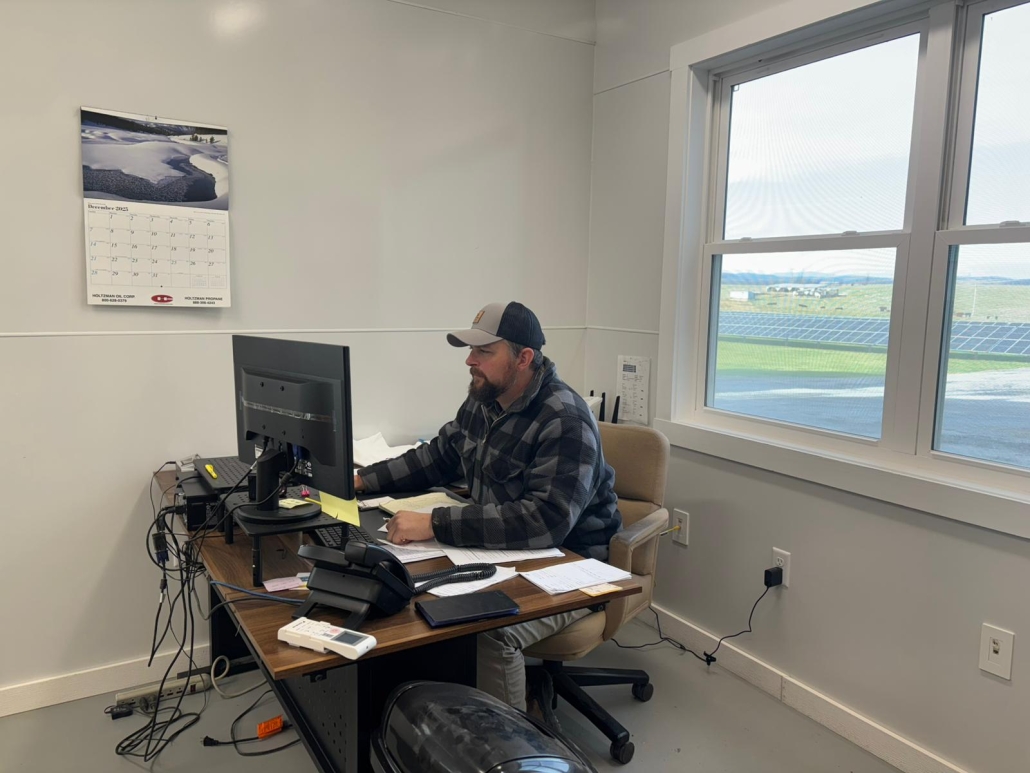 Johnny working at his desk